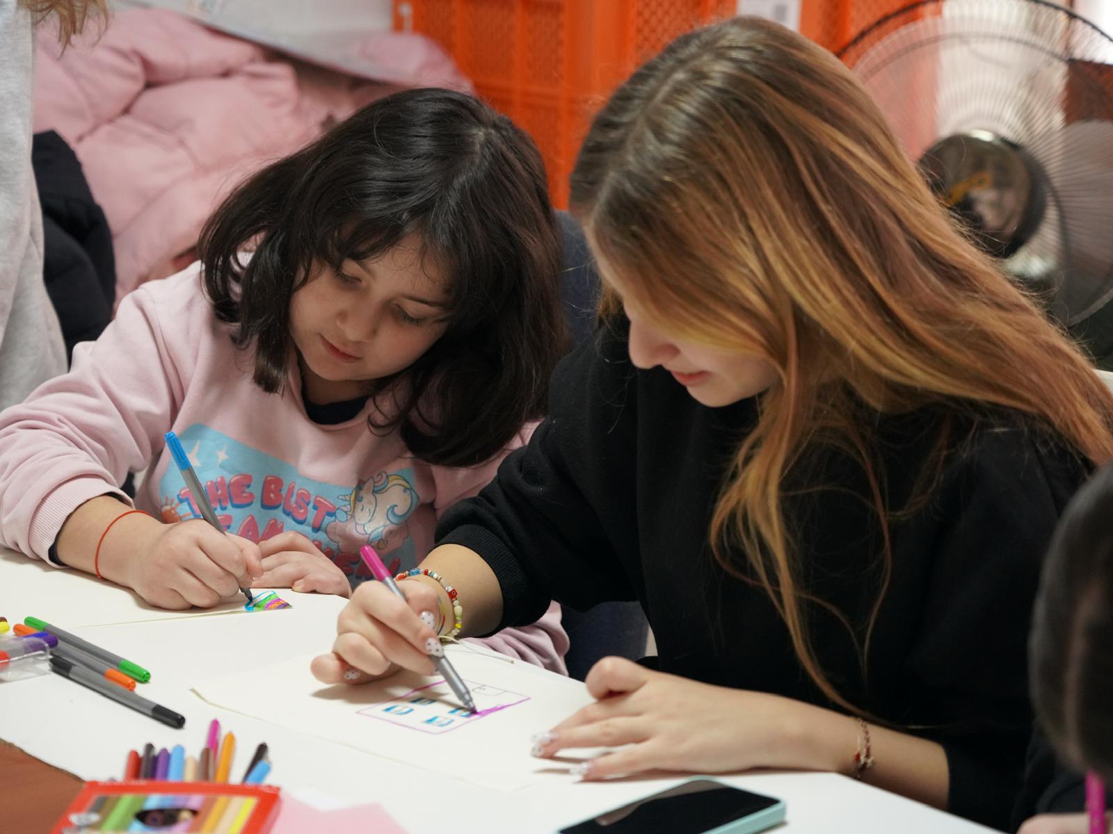 Creating side by side, one drawing at a time